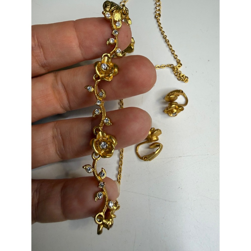 Avon Gold Tone Rhinestone Floral Necklace and Clip-On Earring Set